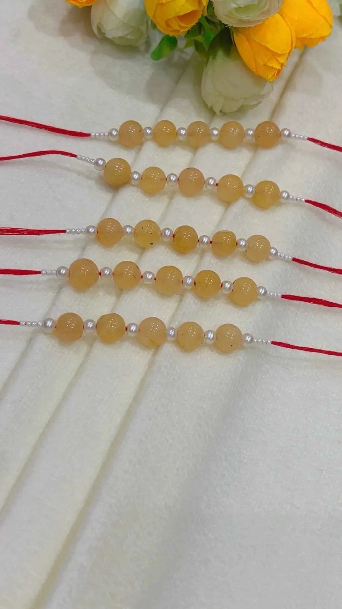 Natural Gemstone Rakhis for Health & Wealth – Pack of 5
