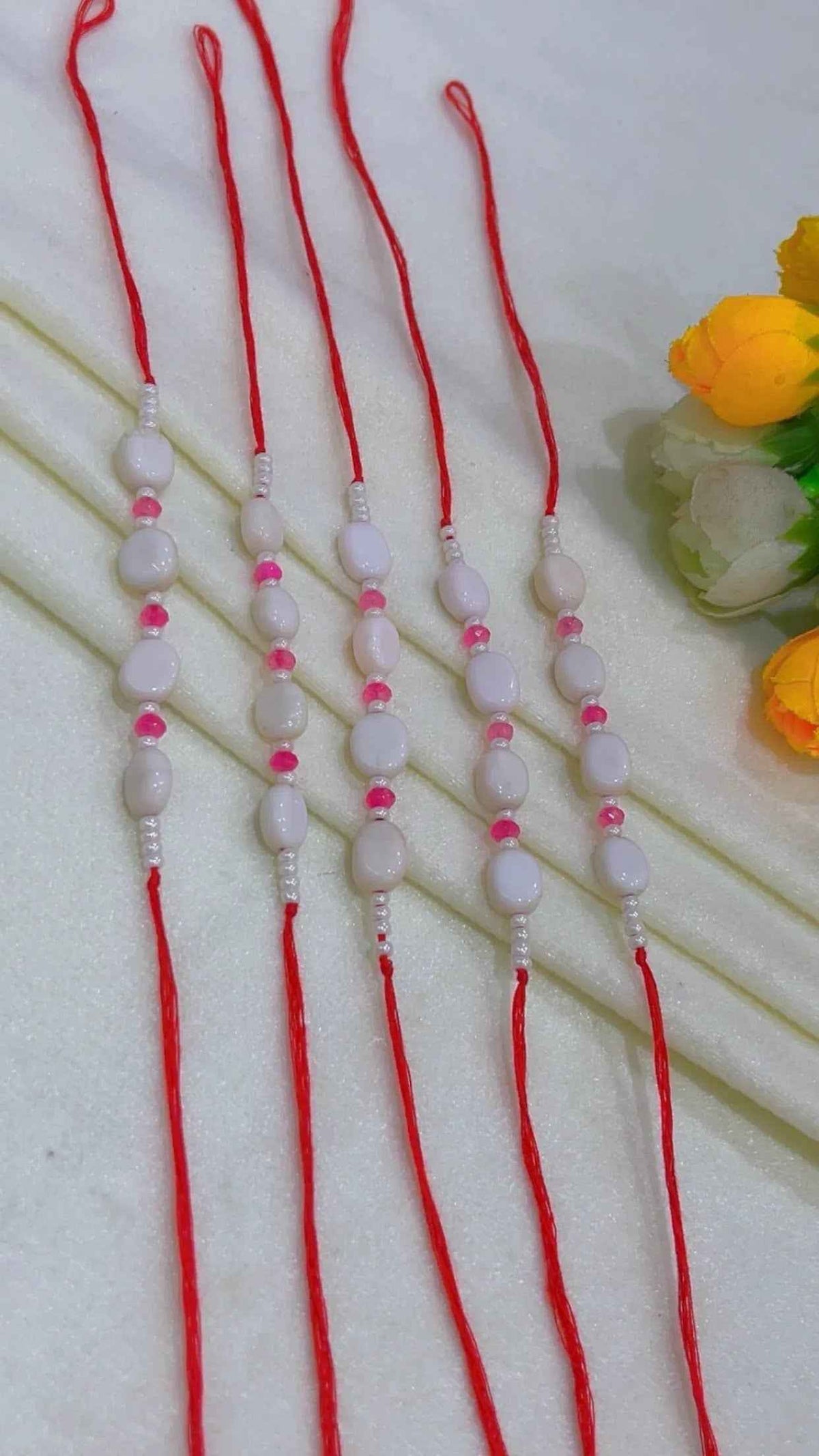 Natural Gemstone Rakhis for Health & Wealth – Pack of 5