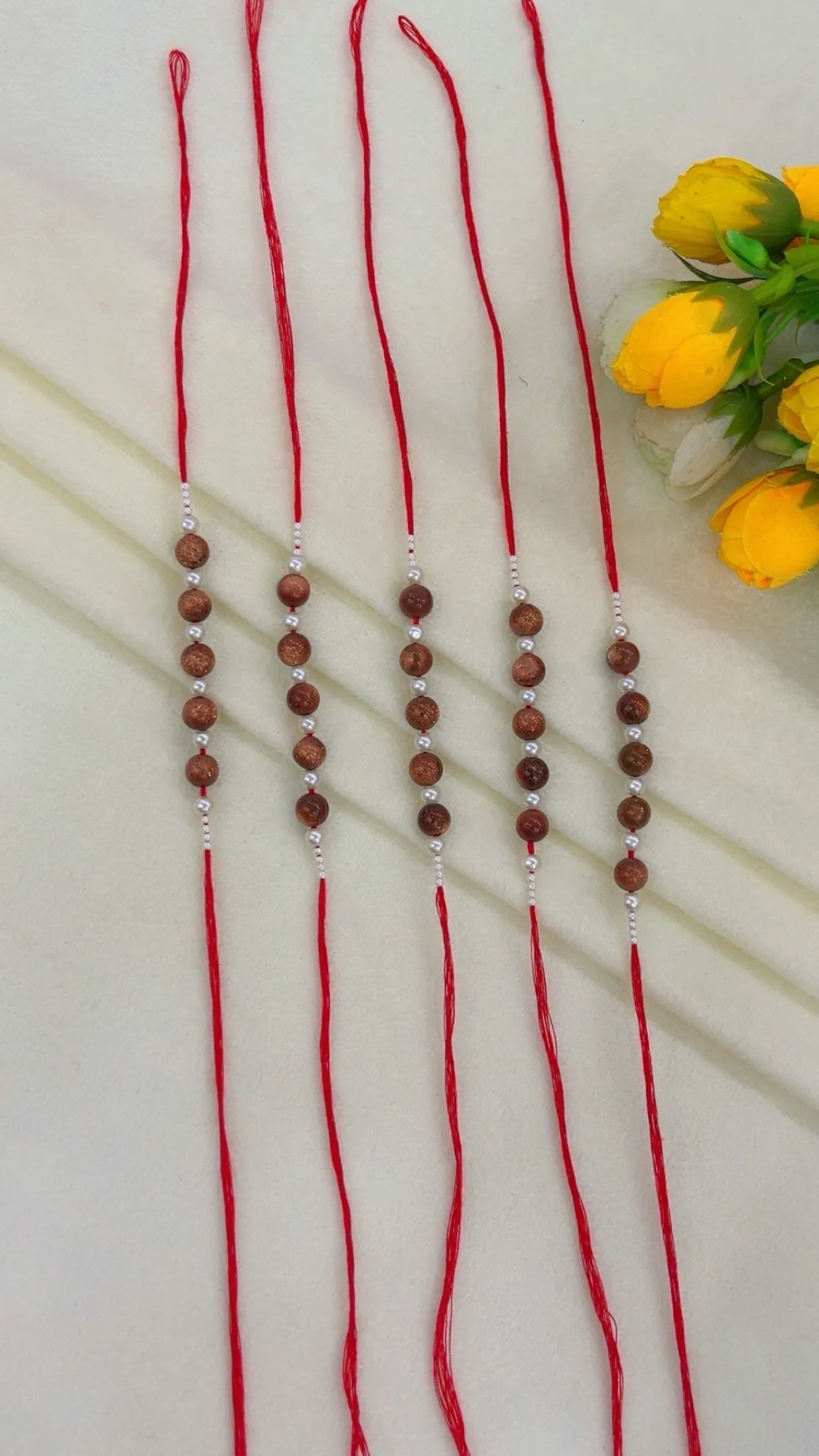 Natural Gemstone Rakhis for Health & Wealth – Pack of 5