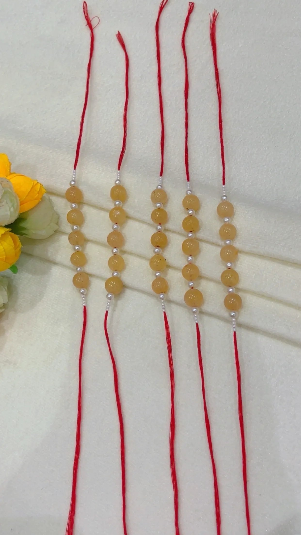 Natural Gemstone Rakhis for Health & Wealth – Pack of 5