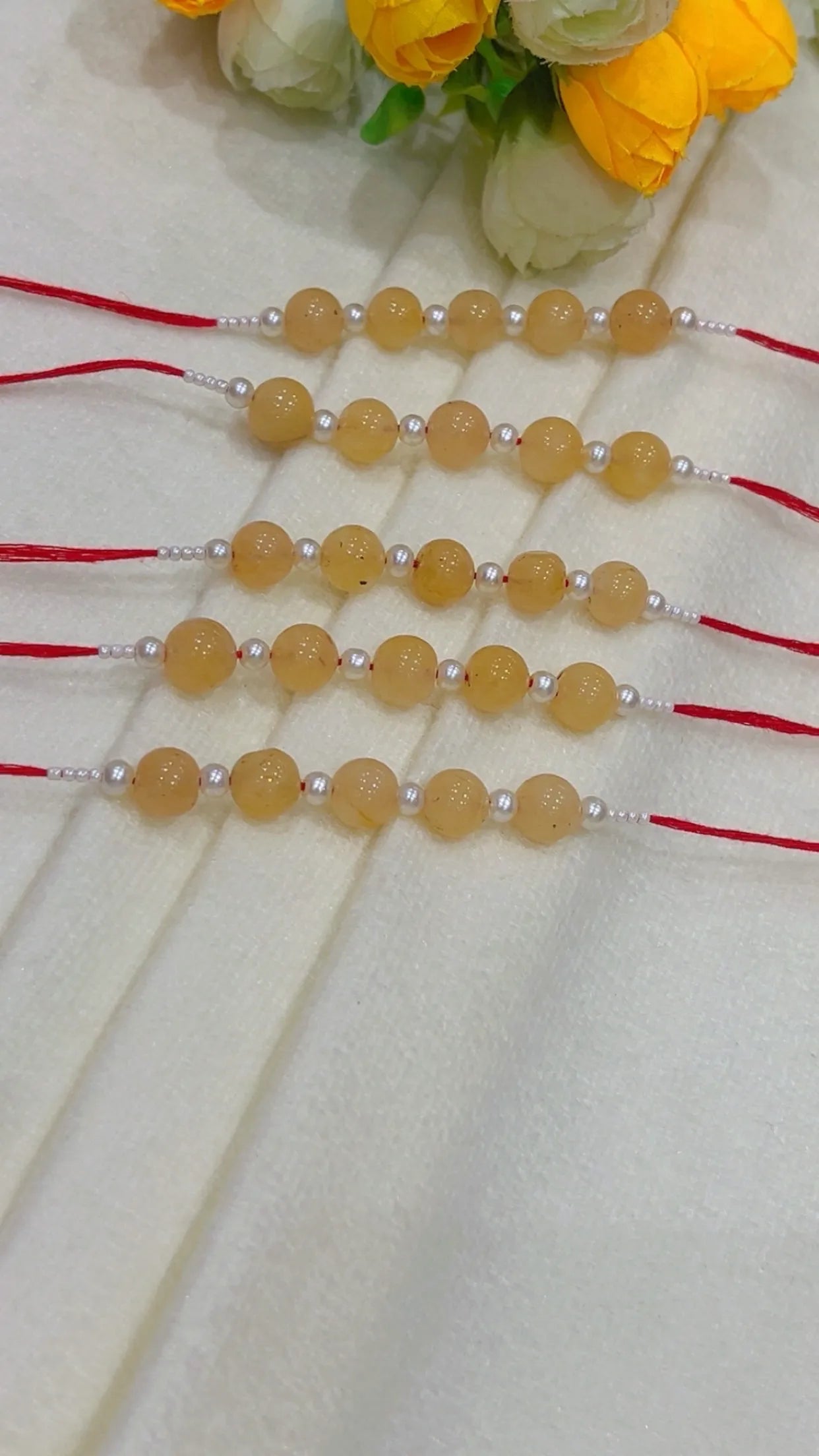 Natural Gemstone Rakhis for Health & Wealth – Pack of 5