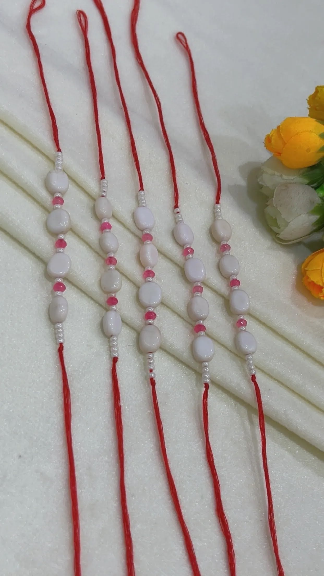Natural Gemstone Rakhis for Health & Wealth – Pack of 5