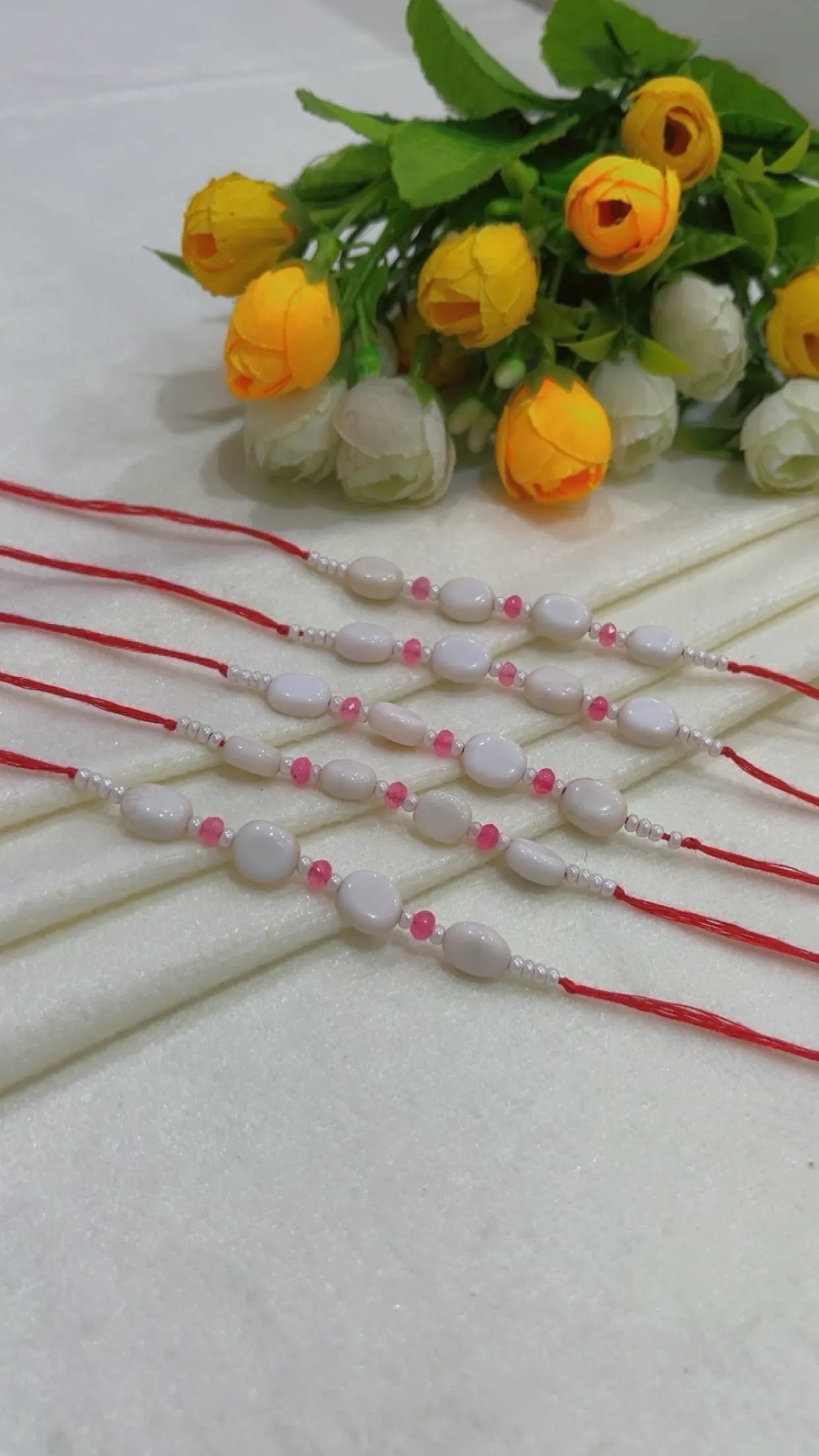 Natural Gemstone Rakhis for Health & Wealth – Pack of 5